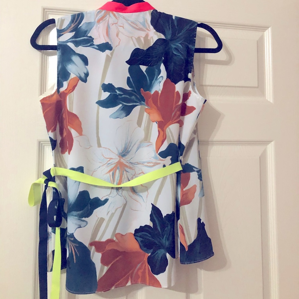 Sleeveless wrap style top